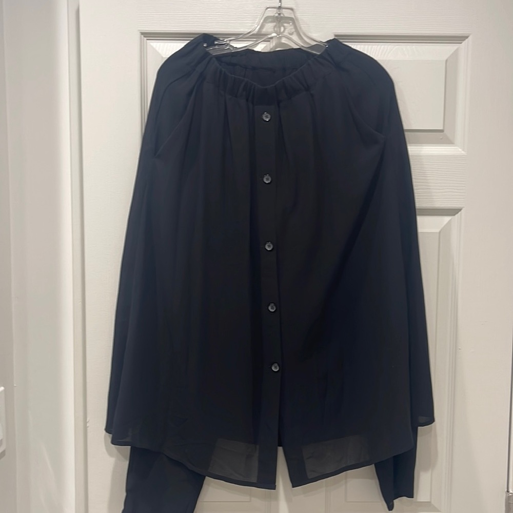 Black Skirt with attached pant, worn once, like new, rayon fabric.